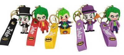 Joker-themed keychains with colorful designs.