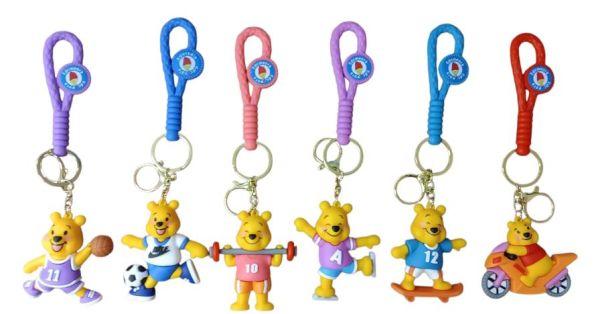 Bear keychains with different sports themes.
