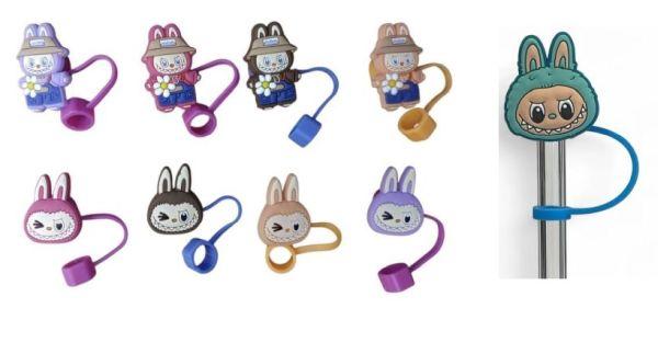 Cartoon animal pen holders in various designs.
