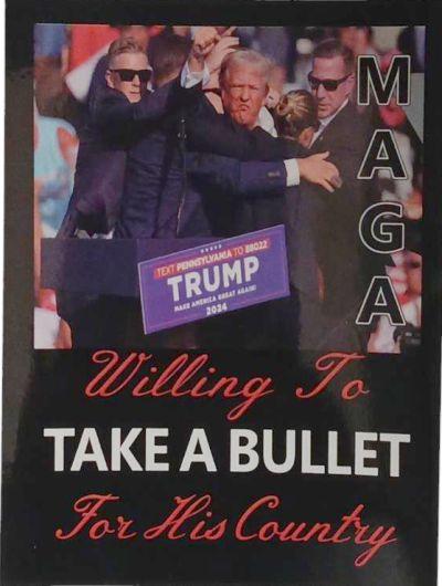 Poster with Trump and "MAGA" text.