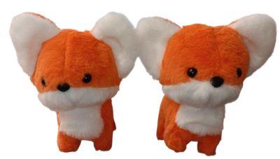 Two orange and white plush fox toys.