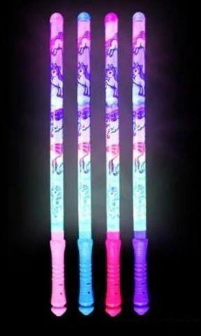 Four colorful unicorn-themed light sticks.