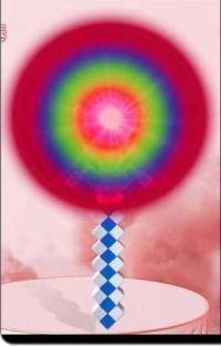 Colorful lollipop with geometric handle design.