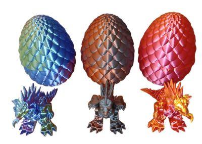 Colorful dragon eggs with dragon figurines.
