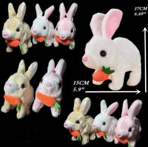 Cute plush bunny toys holding carrots in various colors and sizes.