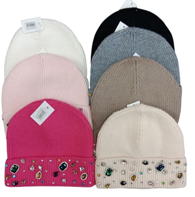 Set of six colorful beanie hats with decorative patterns.