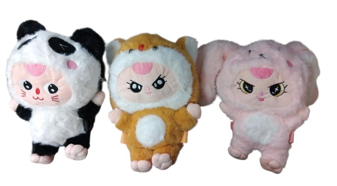Three cute plush dolls in animal costumes with expressive faces.